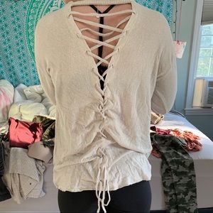 America Eagle cream lace up back sweater